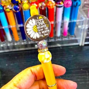Yellow CNA Themed Pen with Sunflower Charm